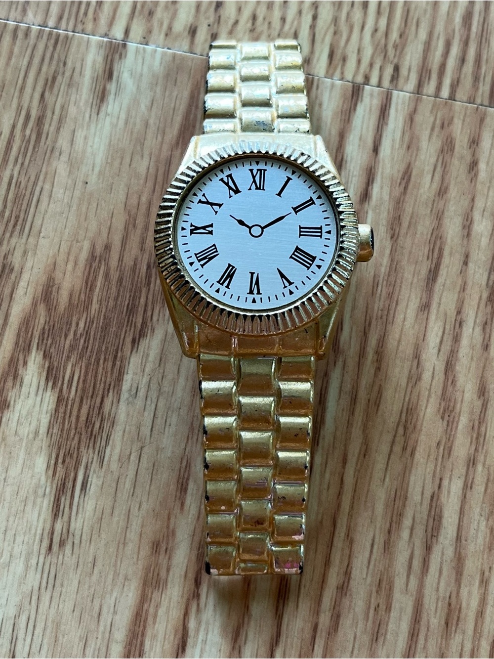 goldtone wristwatch french hair barrette
